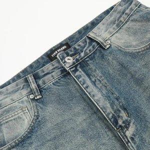 Washed blue distressed vintage jeans by Luxenk© featuring a slim fit and frayed hem, styled on a mannequin.
