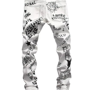 White LUXENK© Graffiti Slim Jeans by Trendsi, slim fit design with subtle graffiti pattern, shown on a model.