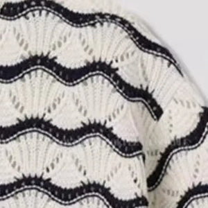 White Luxenk Wavy Stripe T-shirt by Trendsi, featuring a stylish wavy stripe pattern and classic fit in M size.